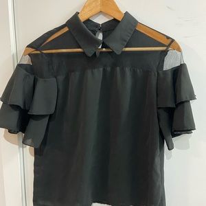 Black frill top with a net